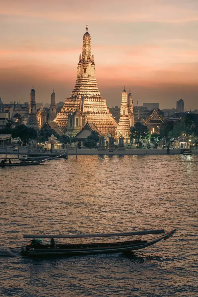 Wat Arun on the Chao Phraya River at dusk